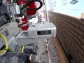 Робот-укладчик кирпича за работой