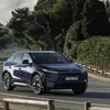 Preview: 2026 Toyota bZ4X in motion, front view in deep blue metallic