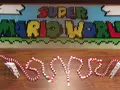Легендарная Super Mario World из 81000 костяшек домино