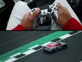 Гонщик управляет суперкаром с помощью геймпада от PS4