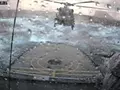 Вертолет садится на авианосец во время шторма