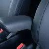 Мініатюра Kia PV5 WAV на парковці біля дерев