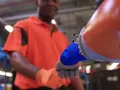 Робот на заводе Ford готовит кофе и делает массаж