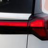 Мініатюра Chevrolet Bolt EV на тлі заводу