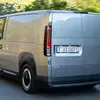 Мініатюра Kia PV5 WAV в русі