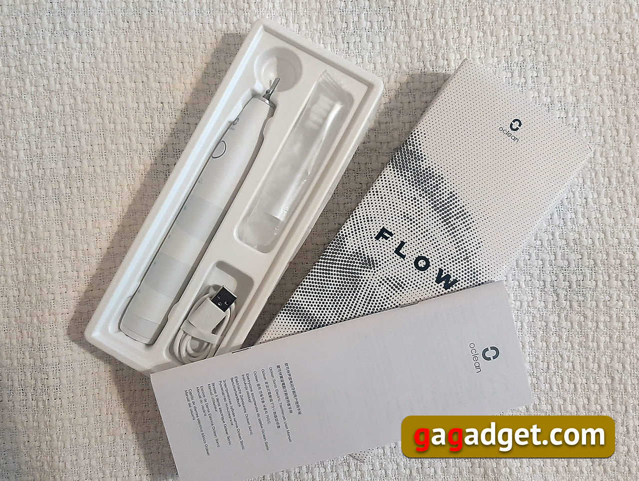 Это не больно. Обзор бюджетной электрической зубной щетки Oclean Flow Sonic-2