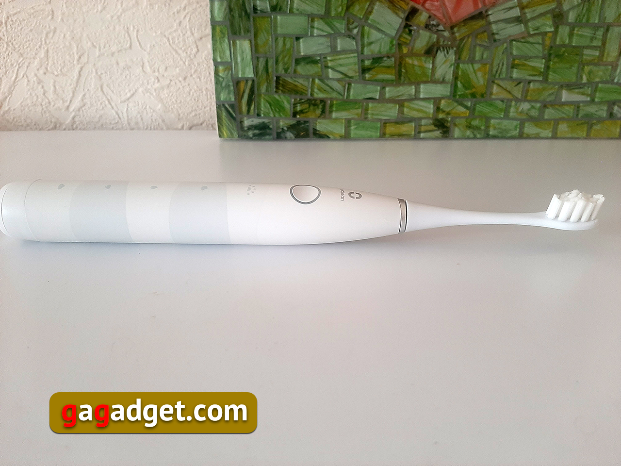 Это не больно. Обзор бюджетной электрической зубной щетки Oclean Flow Sonic-14