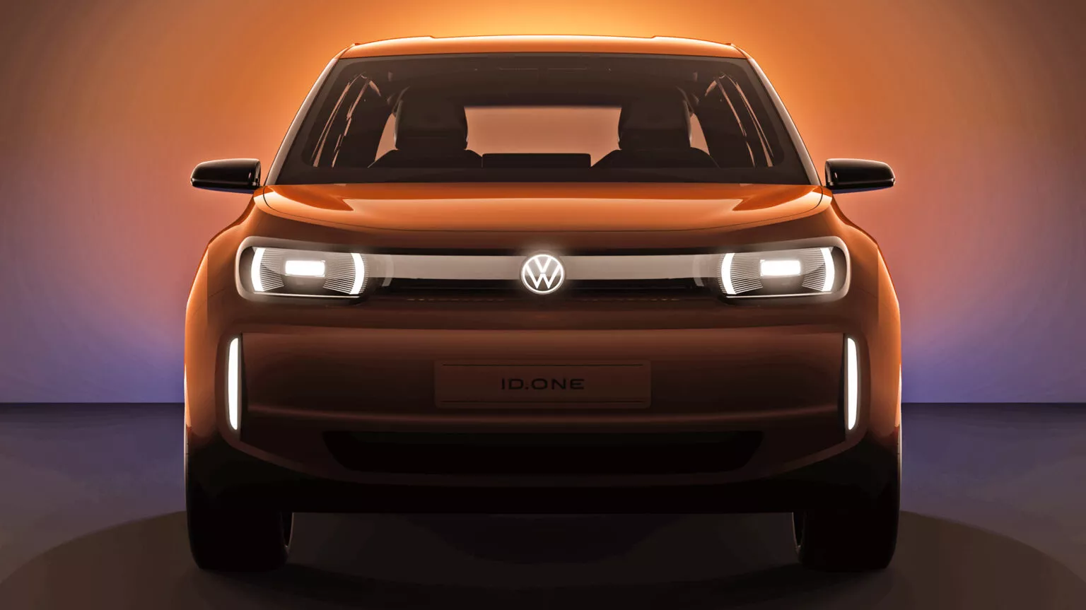 Первый тизер нового электромобиля Volkswagen с надписью 'ID.One' на месте номерного знака.