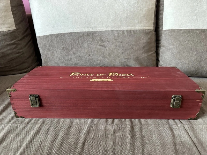 Stylized case with a replica of the Dagger of Time