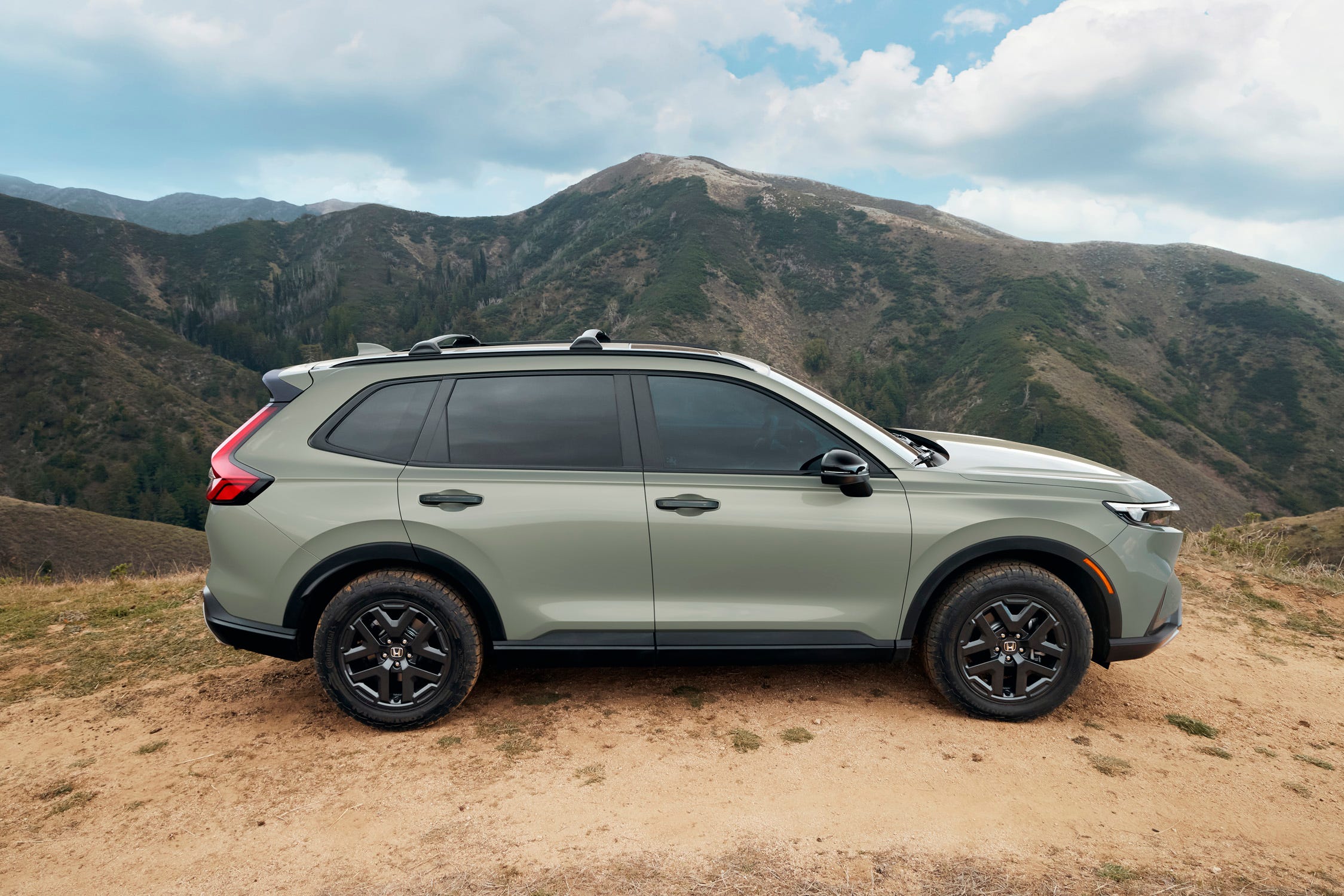 CR-V за кермом, вид ззаду