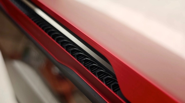 The 14-inch 3K Tandem OLED display supports touch input.